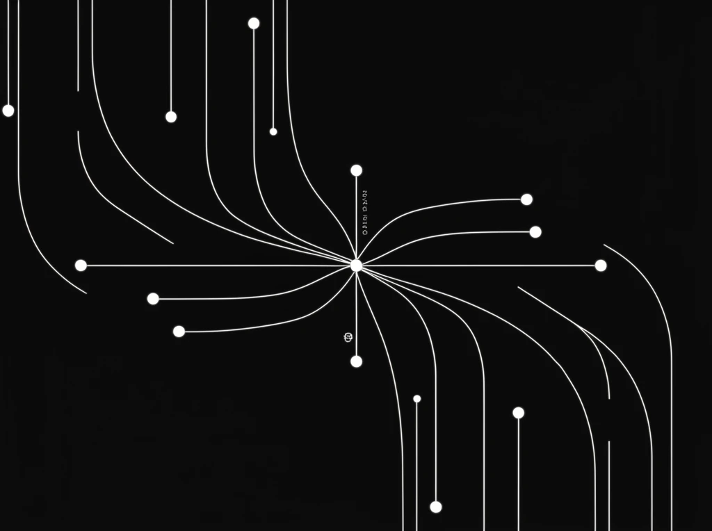 A creative workspace with a laptop, notebook, and coffee cup on a wooden desk